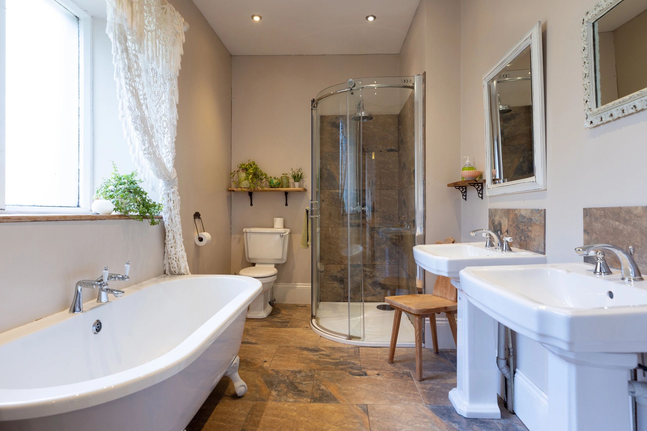 Clean bathroom with bathtub and shower