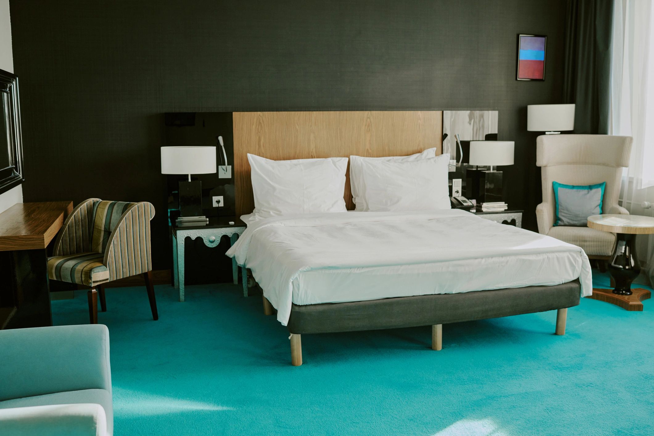 Comfortable bed in a clean, modern room