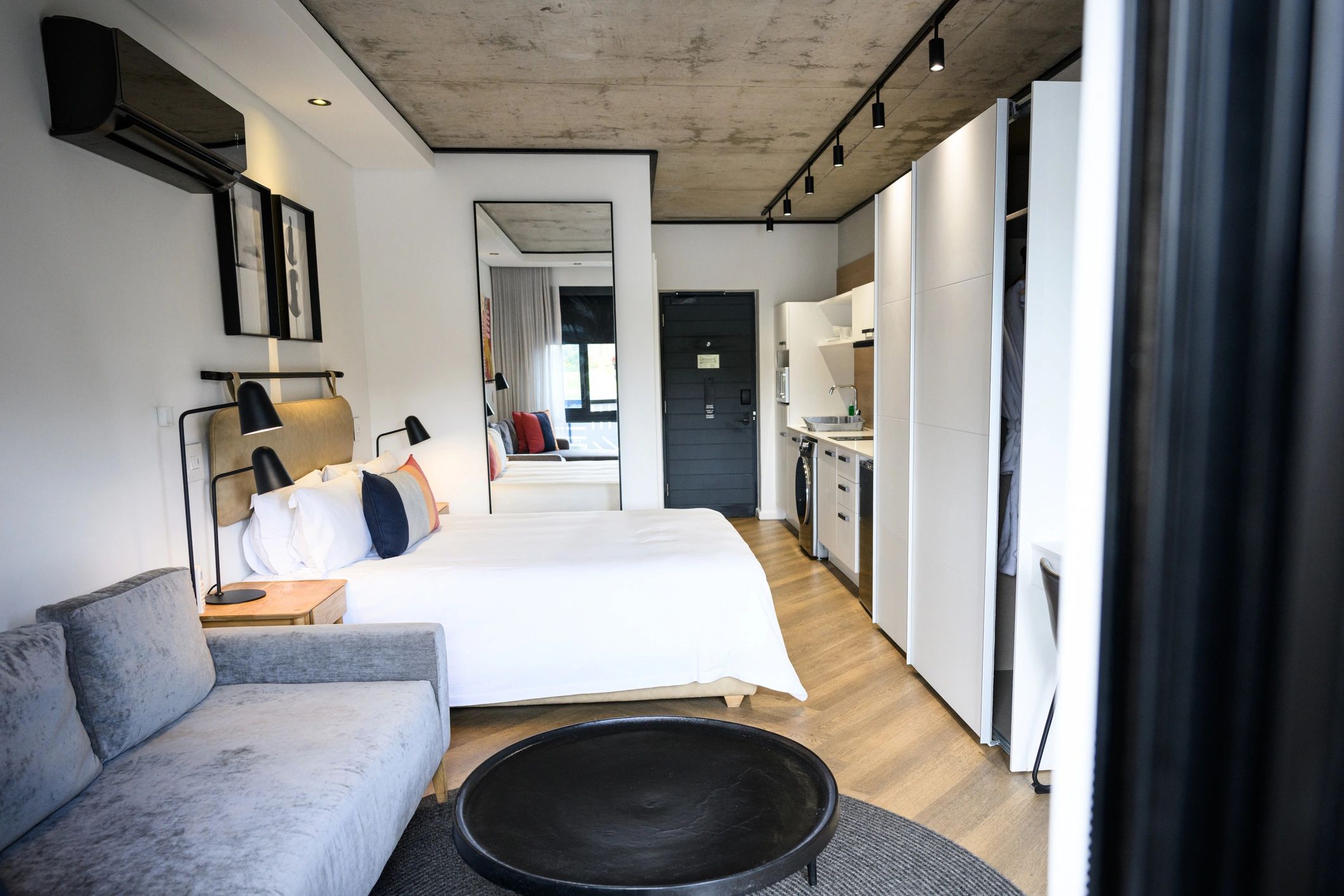 Spacious modern studio-style hotel room interior