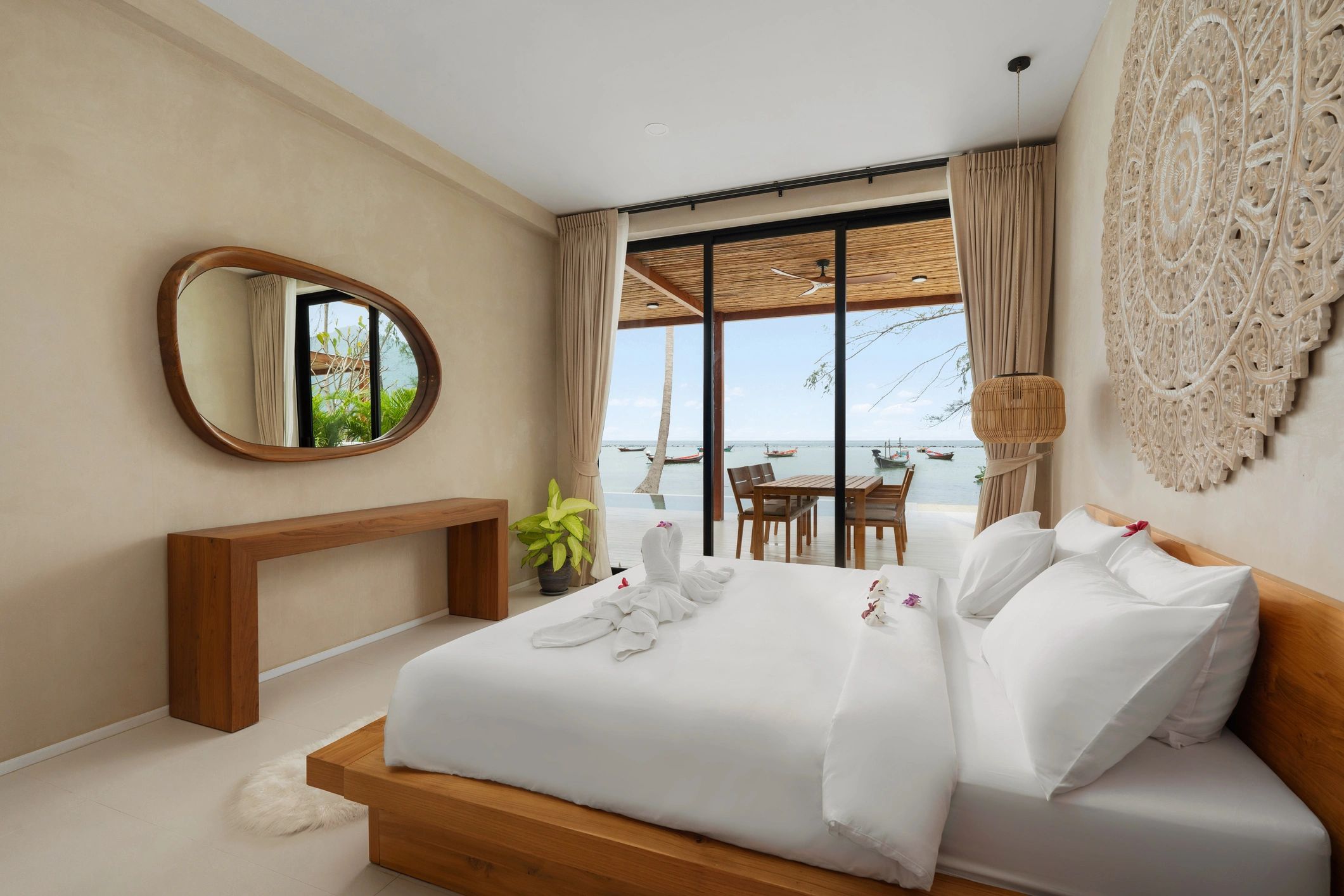 Bright, modern bedroom with crisp white linens